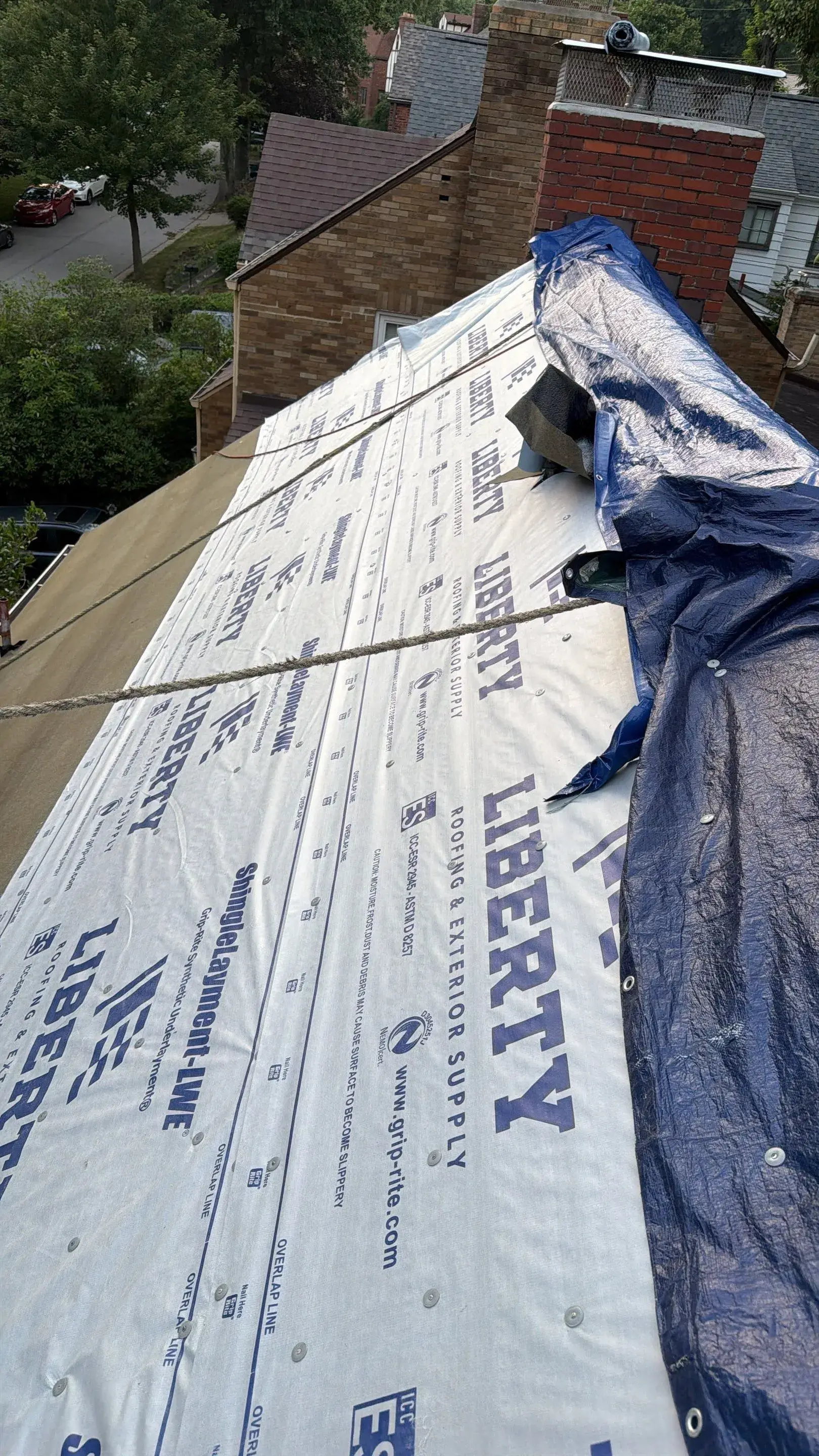 Full tear-off roof replacement in progress in Bucks County, PA — photo 2