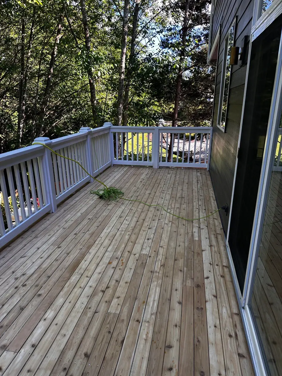 Newly installed wood privacy fencing along a property line — photo 2
