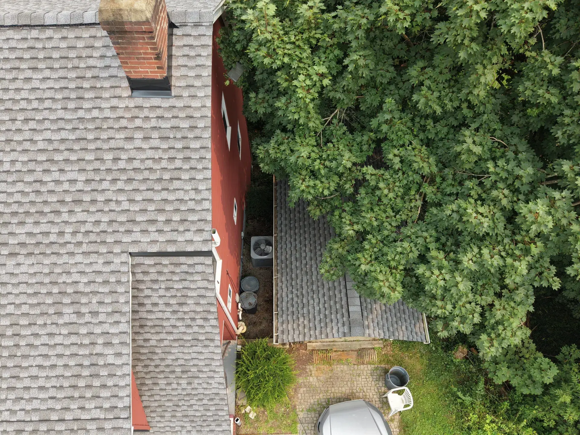 Standing-seam metal roofing panels installed on a residential home — photo 5