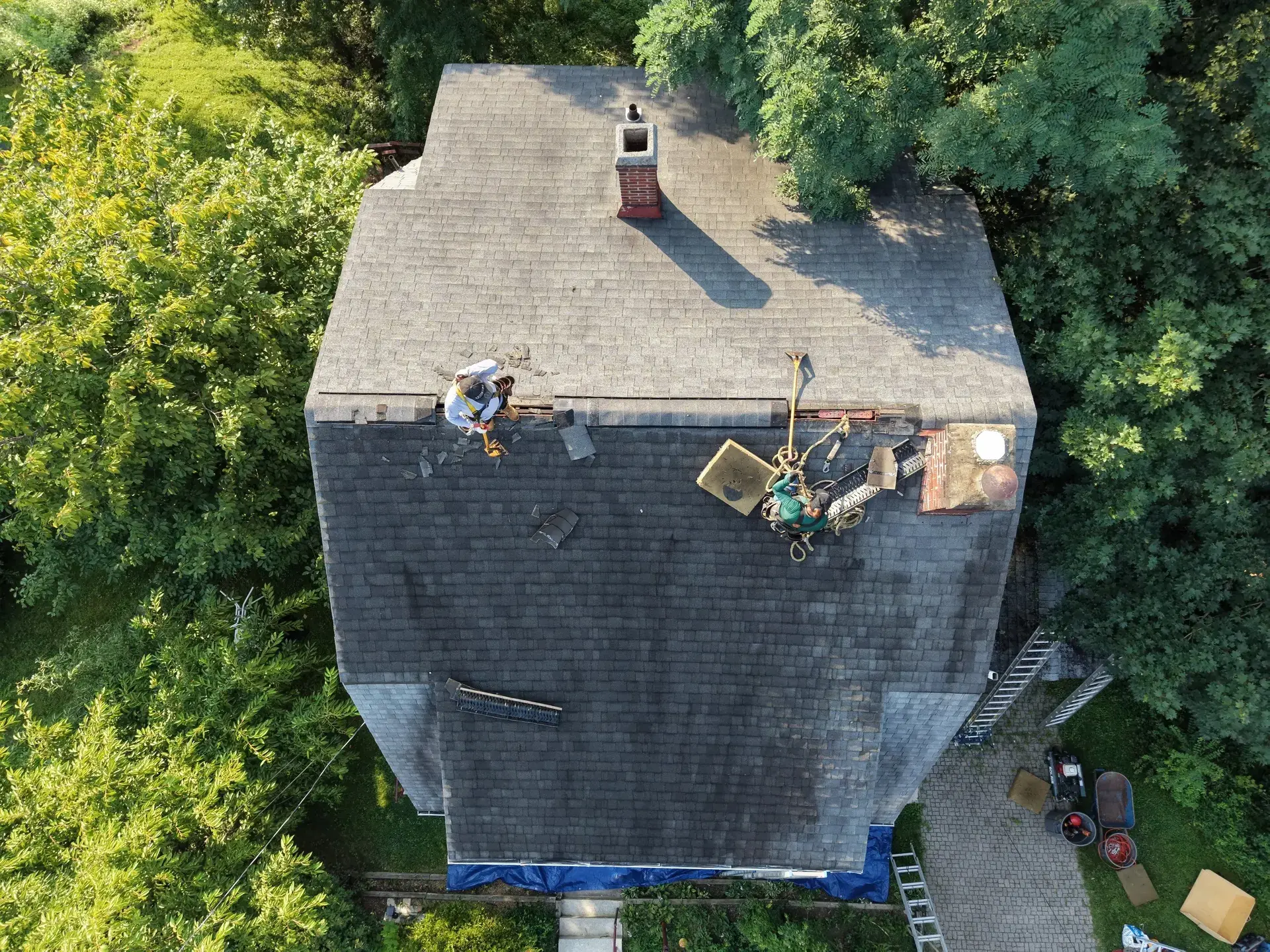 Standing-seam metal roofing panels installed on a residential home — photo 8