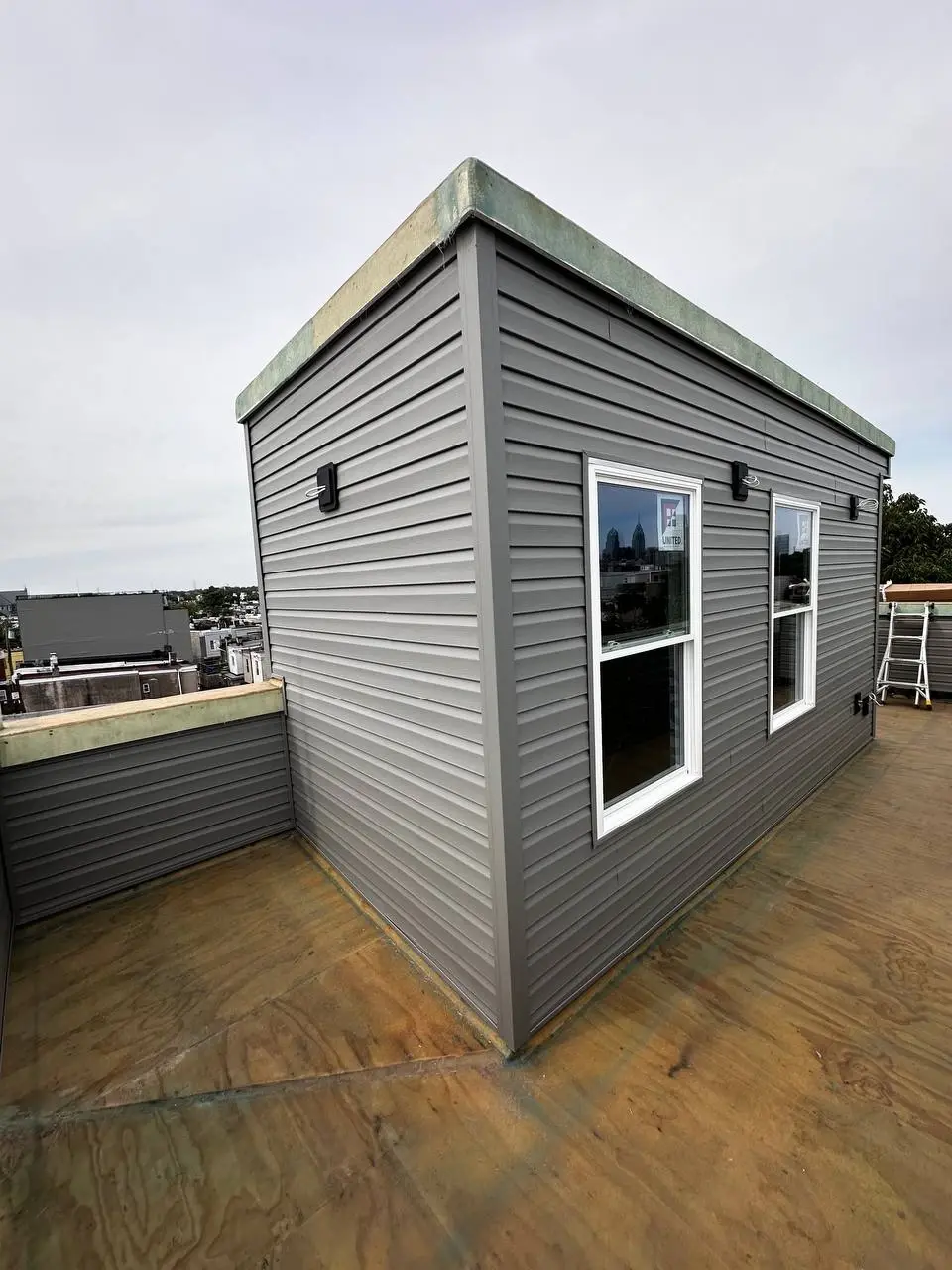 Cedar shake siding installed in a historic-style finish — photo 2