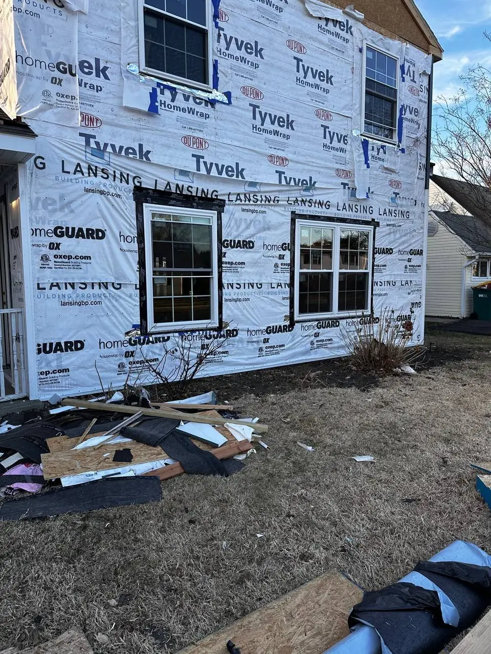 Repair of storm-damaged siding panels on a home exterior — photo 3