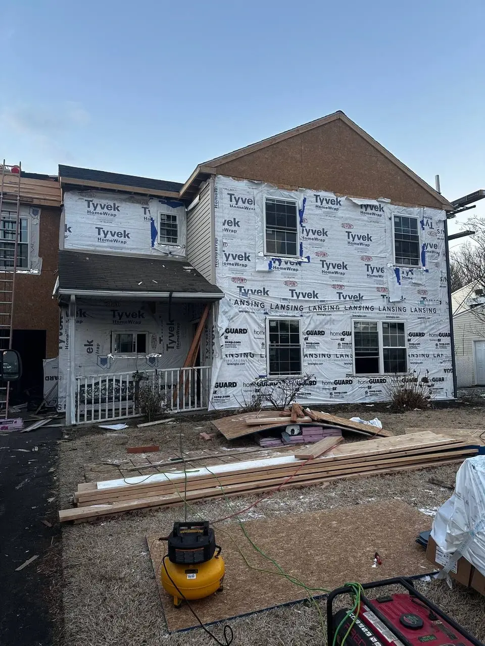 Repair of storm-damaged siding panels on a home exterior — photo 4